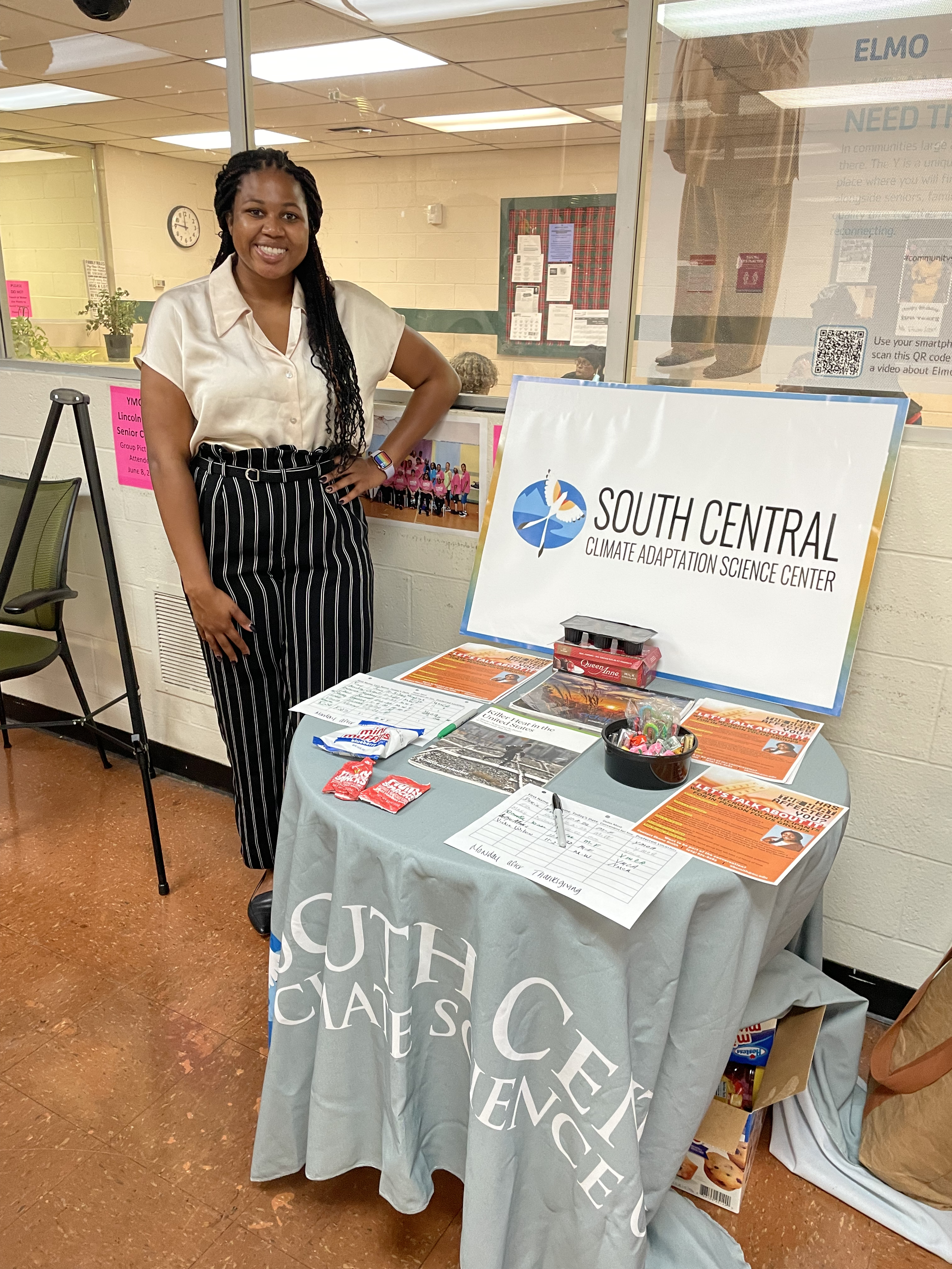 Ebone Smith works at the South Central Climate Adaptation Science Center recruitment table at the Senior Center in Oklahoma City.