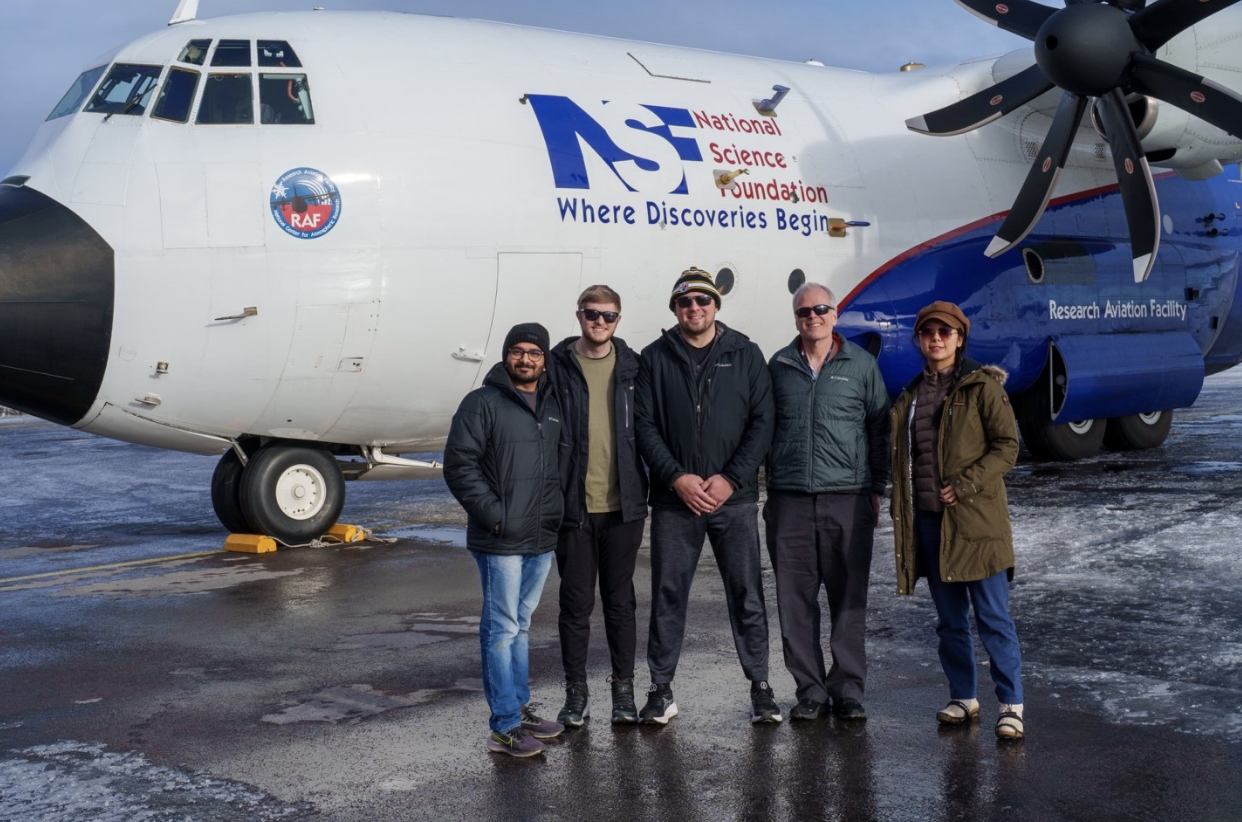 Members of the OU/CIWRO Cloud Physics Group stand with their research plane after a flight on March 12